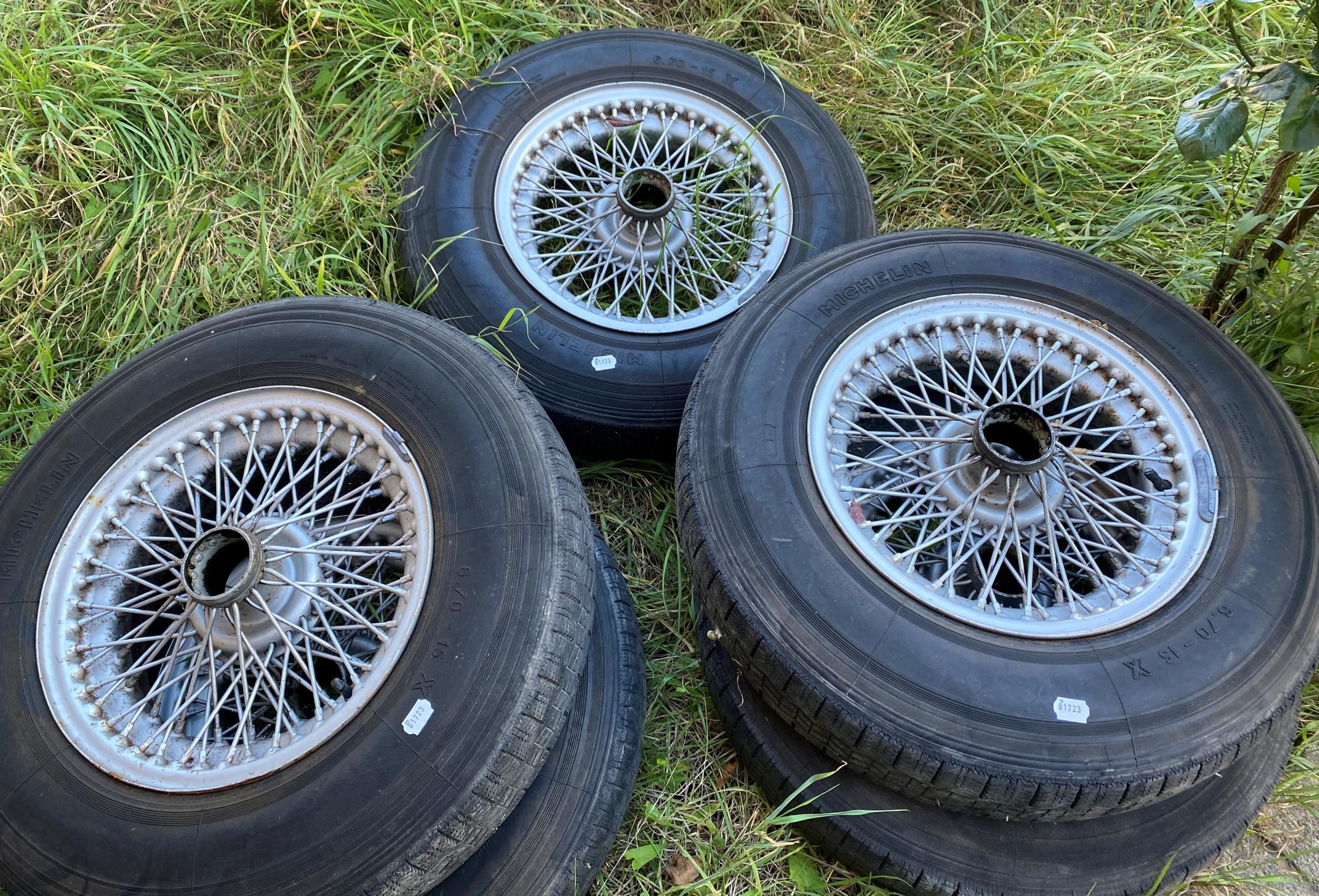 Five wire wheels, with tyres, for an Aston Martin (5) tyres need replacing, understood to be from