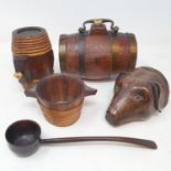 A late Victorian treen stirrup cup, in the form of a dog's head, ears chipped and some loss to the