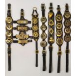 A group of seven Victorian and later leather horse straps, with brasses, including Jumbo, crests, VR