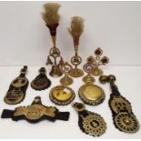 Assorted Victorian and later horse brasses, on straps, bells and other related items (box)