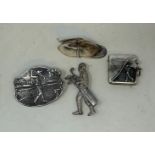 A novelty silver vesta, in the form of a jockey's cap, a silver vesta embossed with a golfer, and