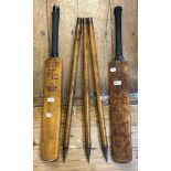 A Stuart Sturridge cricket bat, another and three cricket stumps (5)