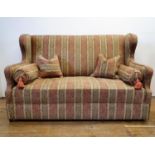 A wing back sofa, 159 cm wide