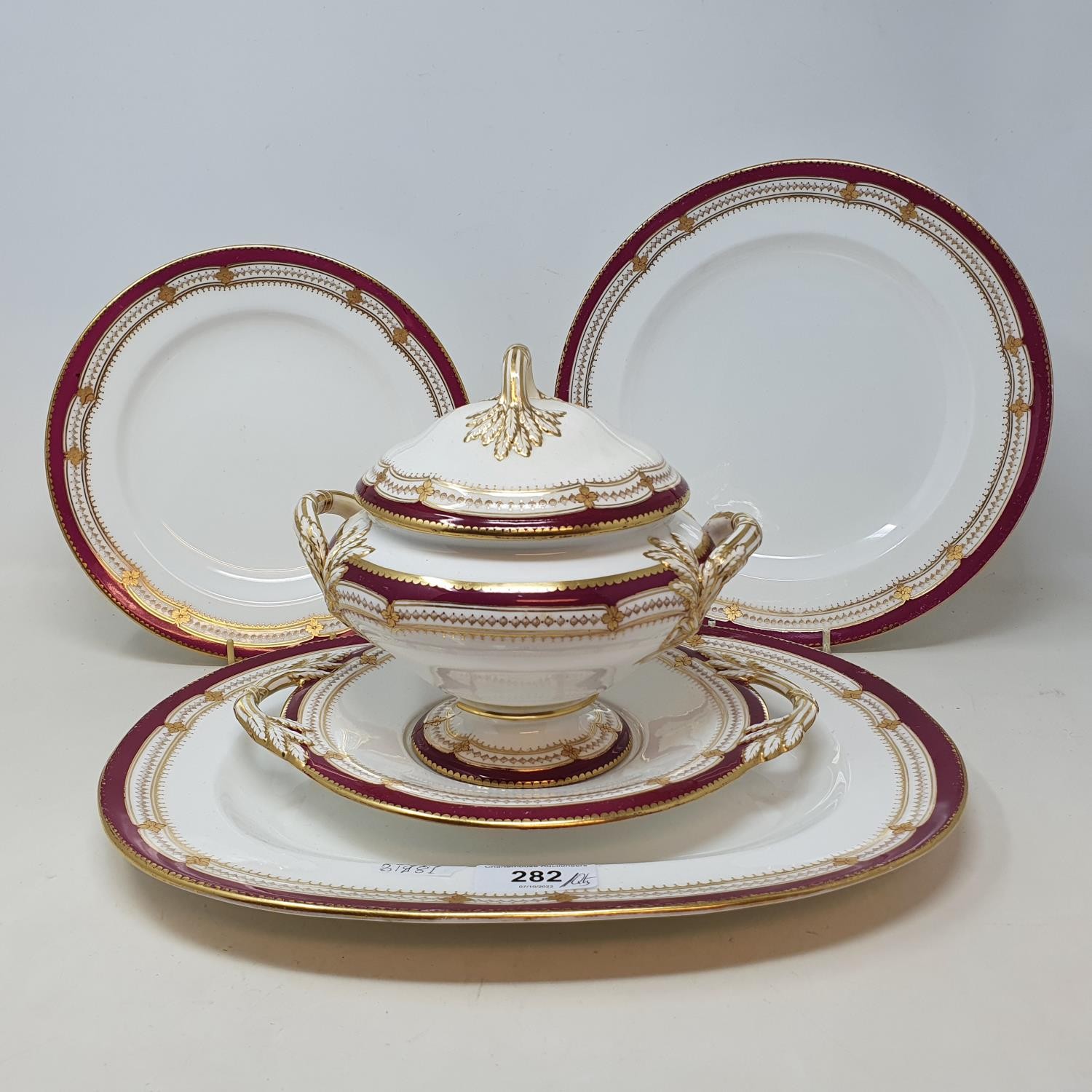 An extensive late 19th/early 20th century dinner service, decorated with a dark pink border, - Image 2 of 5