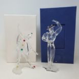 A Swarovski clown, 21cm, boxed, and a Swarovski dancer, 21cm, boxed (2)