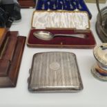 A silver cigarette case, a set of silver spoons, a book slide, two clocks and other items (box)