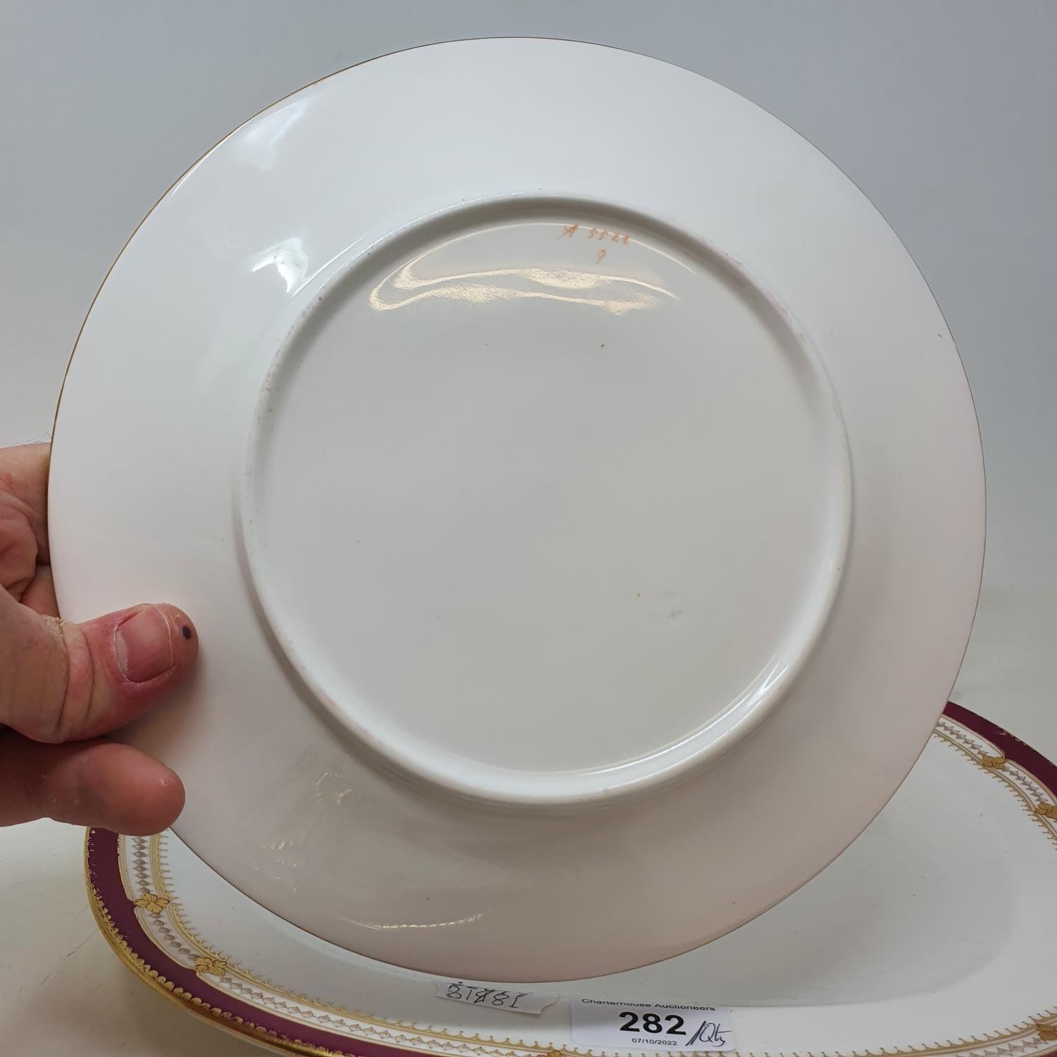 An extensive late 19th/early 20th century dinner service, decorated with a dark pink border, - Image 5 of 5
