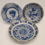 A Delft bowl, 25 cm diameter, and two Delft plates, 22 cm diameter (3) Various cracks, splits and