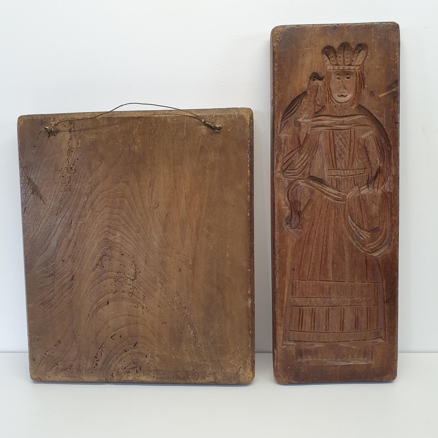 A treen cookie mould, carved figure of a man, 55 cm, and another, carved in the form of a galleon ( - Bild 2 aus 2