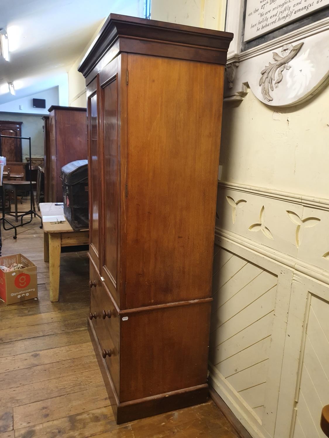 A 19th Century mahogany linen press, two cupboard doors to reveal shelves, on a base with two - Bild 3 aus 4