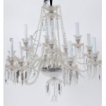 A modern glass twelve branch chandelier, with drops, 80 cm diameter approx, Some drops are off, some