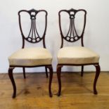 A pair of early 20th century mahogany single chairs, and 19th century receipt, for Brice Webb,