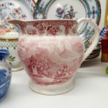 A 19th century red and white jug, decorated hunting scene with an elephant, a blue and white