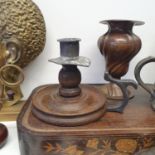 An oak and pewter chamberstick, a pair of wall lights, a modern set of urns, and assorted items (