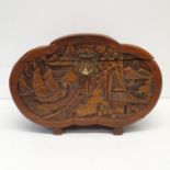 A carved camphorwood box, 33 cm wide