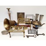 A brass bell, a trivet, a silver plated teapot and assorted metal ware (box)