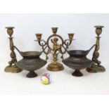 A pair of bronze vases, 13 cm high, a pair of candlesticks, and a two branch candelabrum (5)