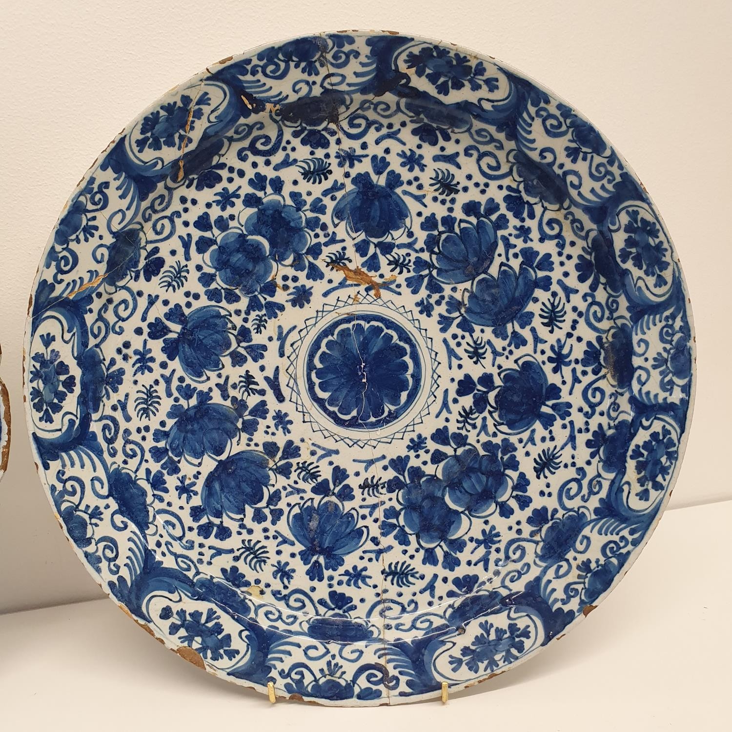 A 19th century blue and white Delft plate, 35 cm diameter, and another, 35 cm diameter (2) The - Image 3 of 5