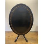 A late 19th century ebonised centre table, with marquetry decoration The top 130 x 91 cm, various
