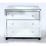 A mirrored chest of three long drawers, 100 cm wide