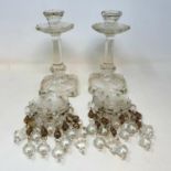 A pair of glass table lustres, 20 cm high, and two spare sets of drops (2) The drop bases have
