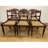 A set of six 19th century rosewood bar back dining chairs, with reeded seats, on turned tapering