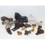 A cast iron doorstop, in the form of a lion, and other lion ornaments (box)