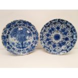A 19th century blue and white Delft plate, 35 cm diameter, and another, 35 cm diameter (2) The
