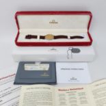 An Omega De Ville gentleman's wristwatch on a leather strap, with box and paperwork