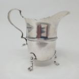 An Elizabeth II silver cream jug, London 1958, 2.5 ozt Provenance: From a large single owner