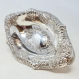 A Victorian silver oval bowl, raised on a foot, with floral decoration, Chester 1895, 14.4 ozt