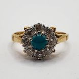 An 18ct gold, turquoise and diamond ring