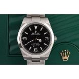 A gentleman's stainless steel Rolex Explorer, having a black dial, with guarantee card (2018),