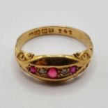 An 18ct gold and ruby ring, ring size N, 2.5 g (all in)