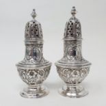 A William IV pair of silver pepperettes, London 1830, 4.8 ozt, 10 cm high (2) Provenance: From a