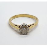 An 18ct gold and diamond solitaire ring, ring size L 1/2