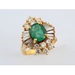 An 18ct gold, emerald and diamond ring, ring size M Overall condition good, was purchased in the