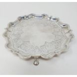 A silver coloured metal salver, 19 cm diameter Not marked, appears to be silver, 7 ozt, general wear