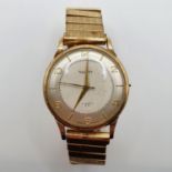 A 9ct gold Rotary gentleman's wristwatch, on a later gold plated strap, lacking winder, in need of