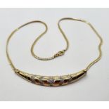 A 9ct gold and diamond necklace, 7.8 g (all in)