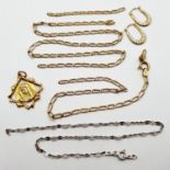 An 18ct gold pendant, a 9ct gold necklace, a silver bracelet, and a pair of 9ct gold earrings