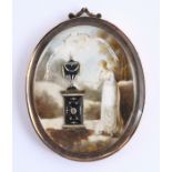 An unusual miniature, of a young lady by a garden urn, in a yellow metal mount, 7 x 5 cm cracked