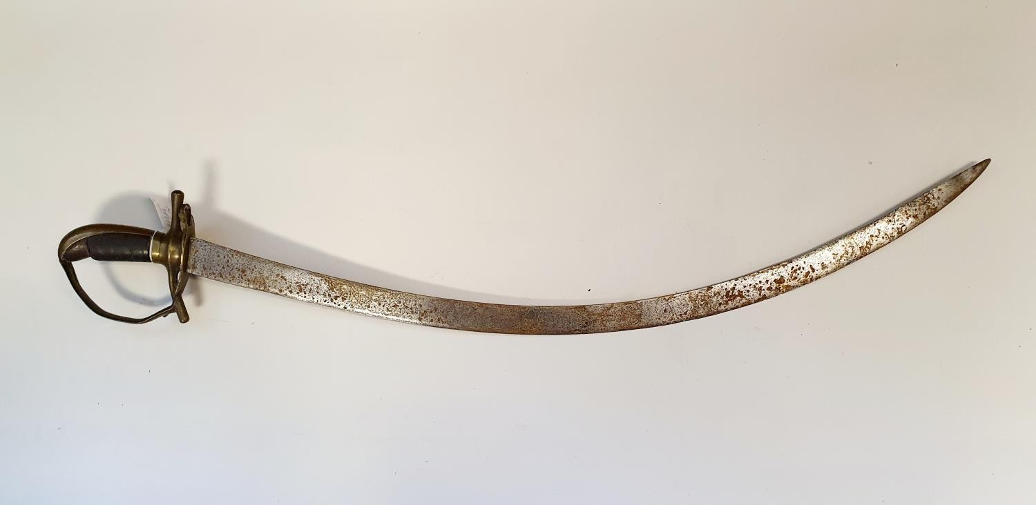 A Moorish sabre, the curved blade with gilt metal inlaid section, and having a brass guard and hilt, - Image 2 of 4