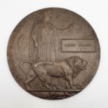 A WWI bronze death plaque, Henry Reader (48977 Pte Henry Reader Lincolnshire Regiment), with slip