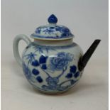 A Chinese porcelain teapot and cover, with floral decoration in underglaze blue, 13.5 cm high