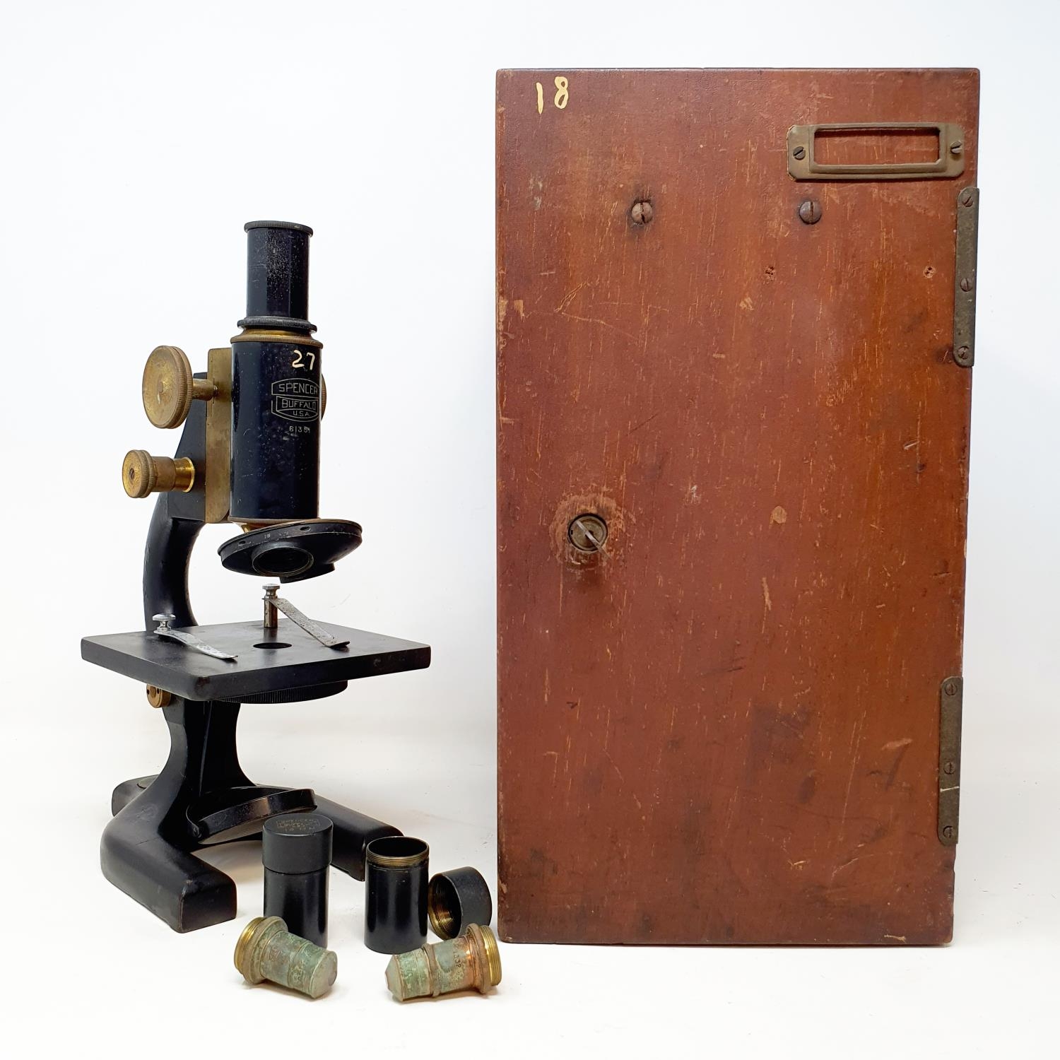 An early 20th century student's microscope, in an oak case