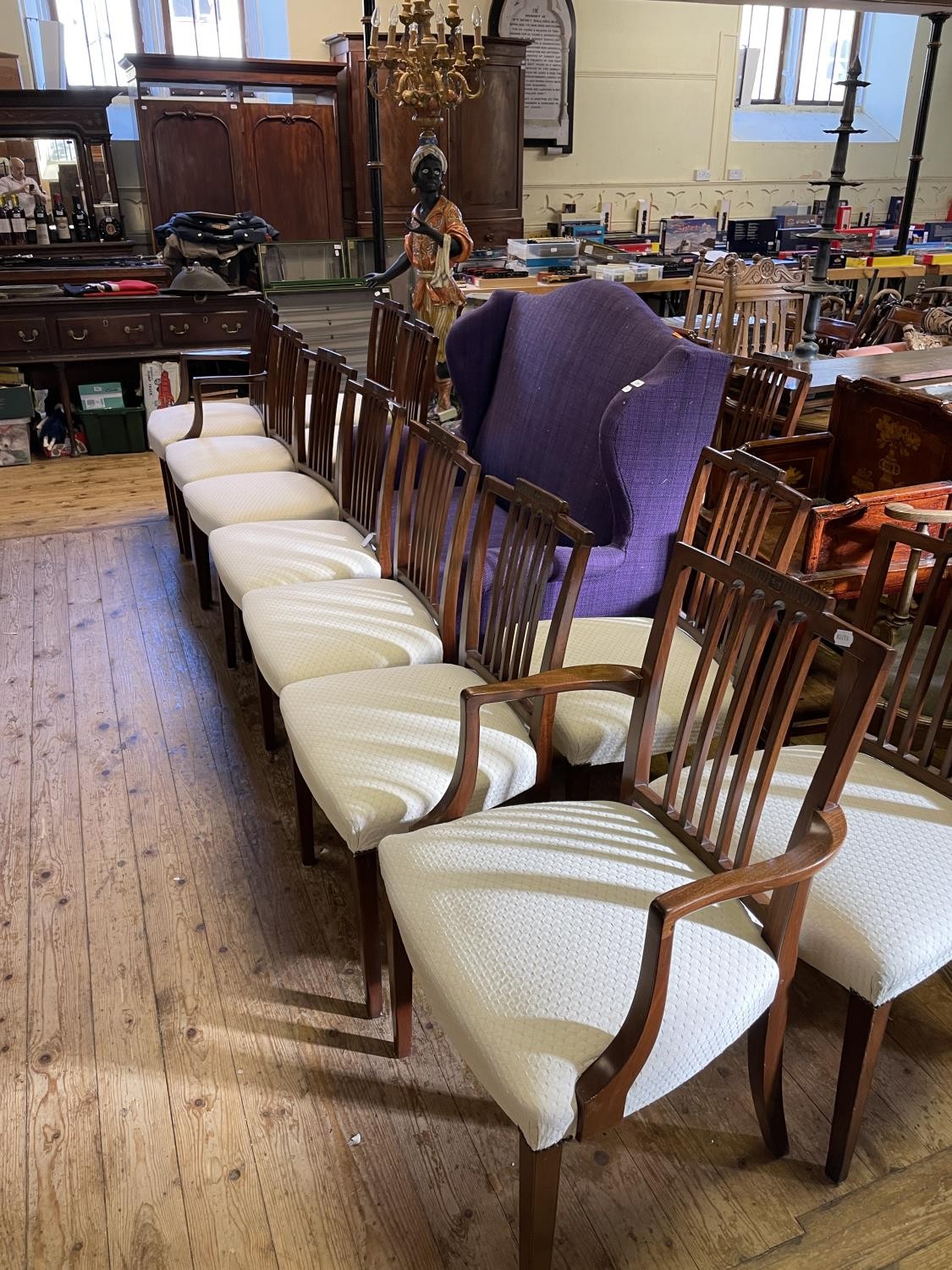 A set of twelve early 20th century mahogany Sheraton style dining chairs, with padded seats on - Image 2 of 2