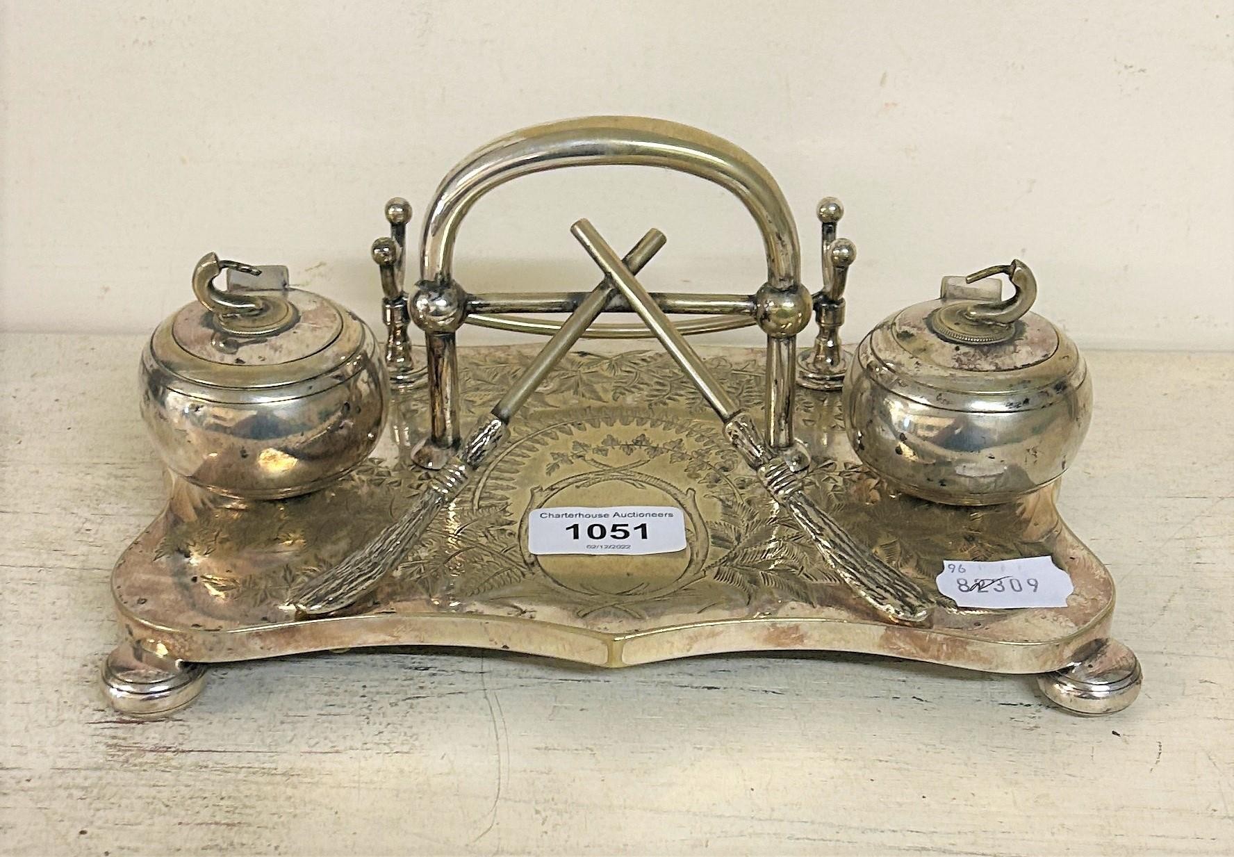 An unusual desk stand, the inkwells in the form of curling stones, with brooms, 25 cm wide