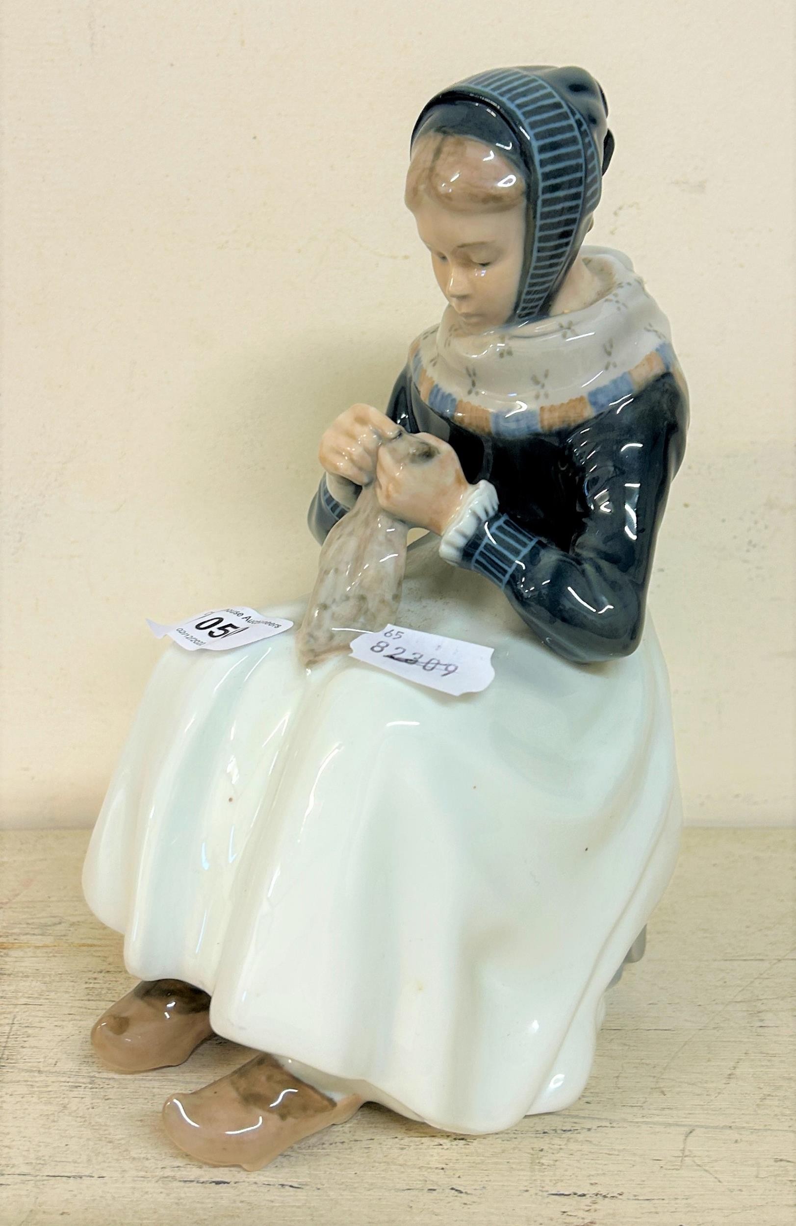 A Royal Copenhagen figure, of a woman, 24 cm high