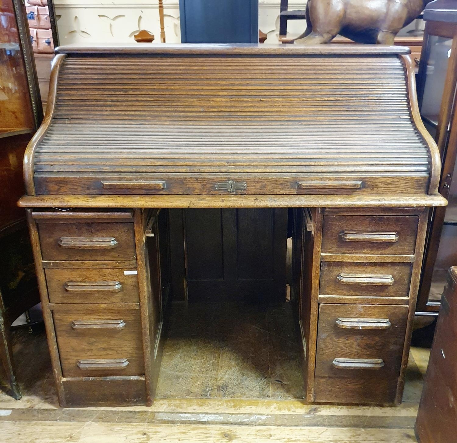 An oak tambour front desk, 128 cm wide, in need of extensive restoration, a mahogany display - Image 2 of 5